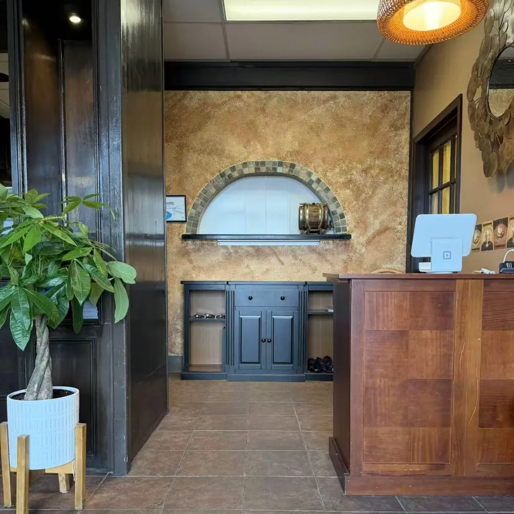 Restaurant entrance with plants at Eraka Sushi, a Japanese Restaurant in Easton