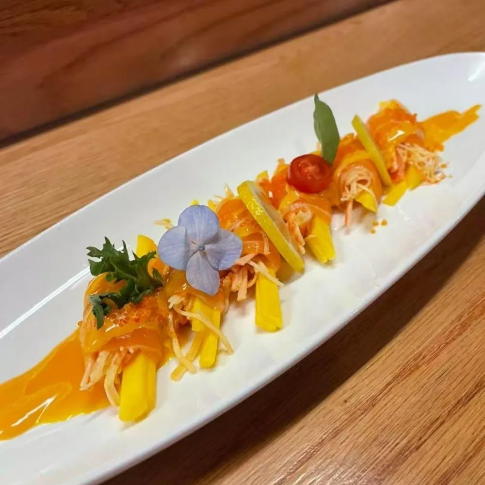 Mango-wrapped sushi with sauce at Eraka Sushi, a Japanese Restaurant in Easton