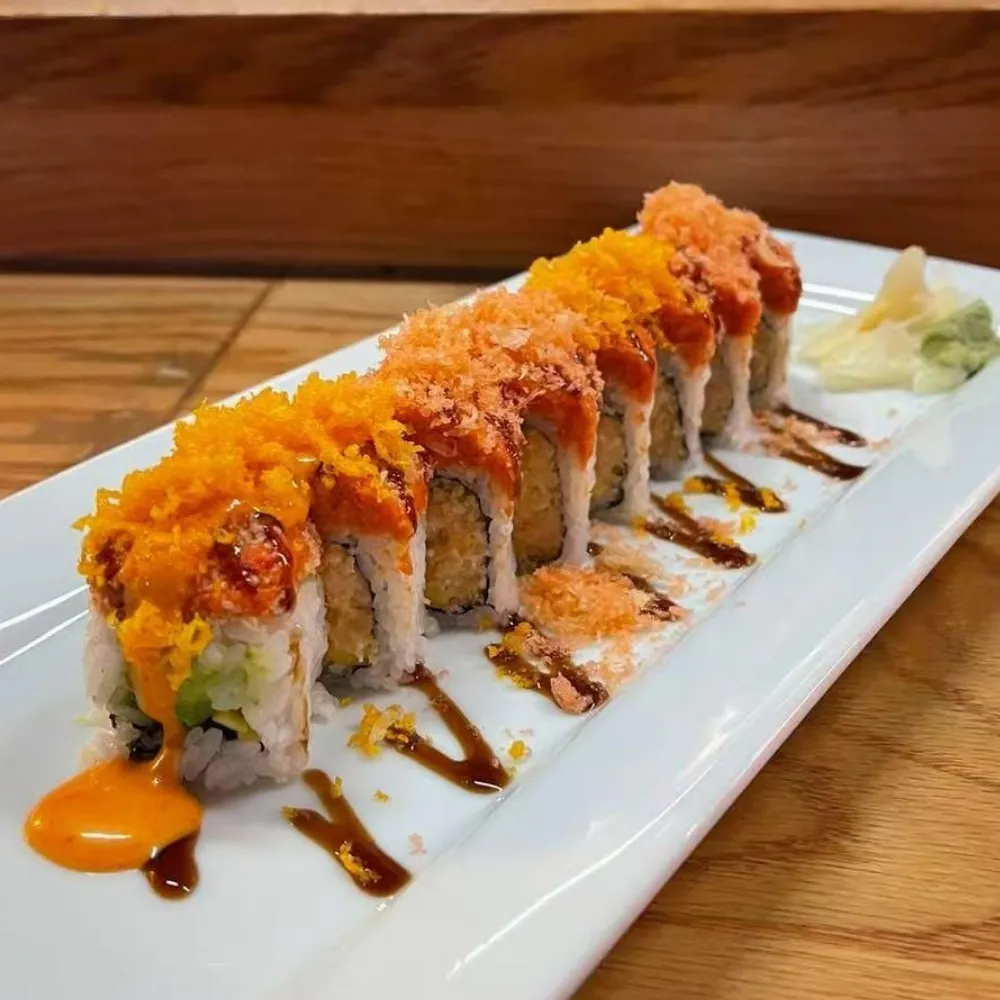 Tobiko-crusted sushi roll with sauces at Eraka Sushi, a Japanese Restaurant in Easton